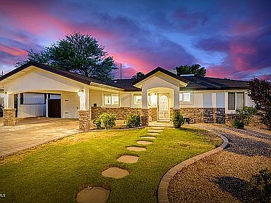 Charming Arcadia home with covered carport and inviting front entry