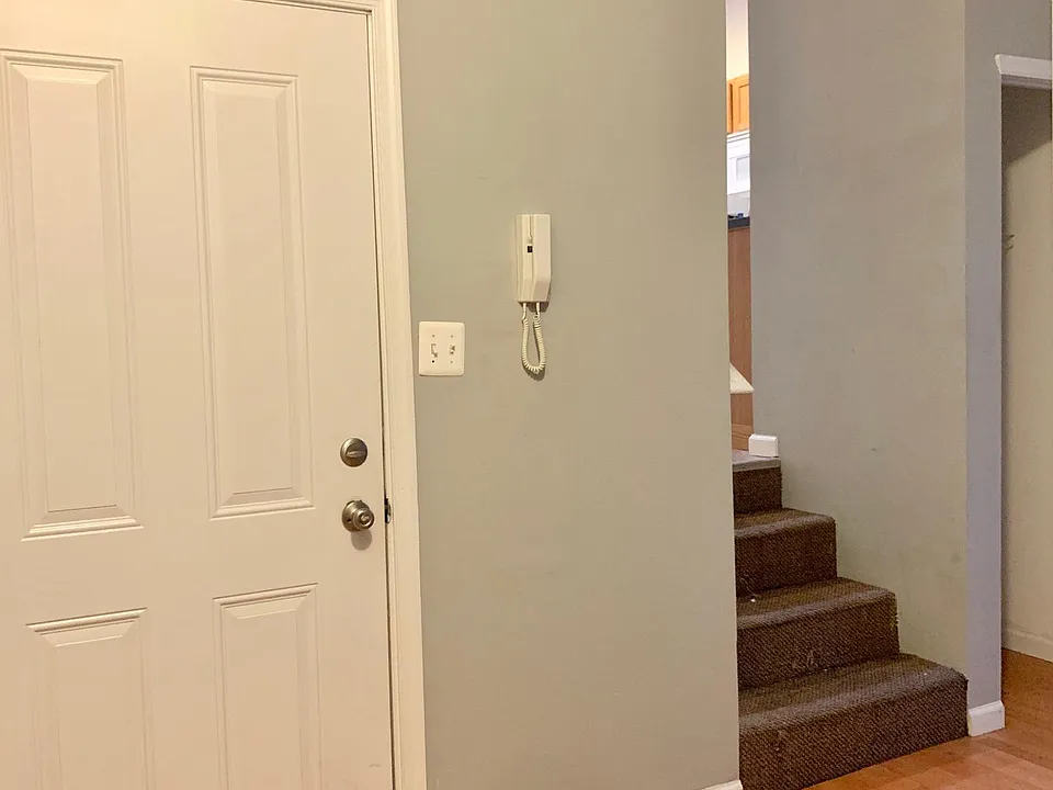 Apartment entrance, duplex staircase