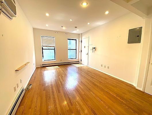 1st image of 302 E 52nd St APT 402