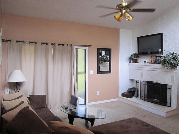 Living room with vaulted celing, new fan and 42" Samsung TV