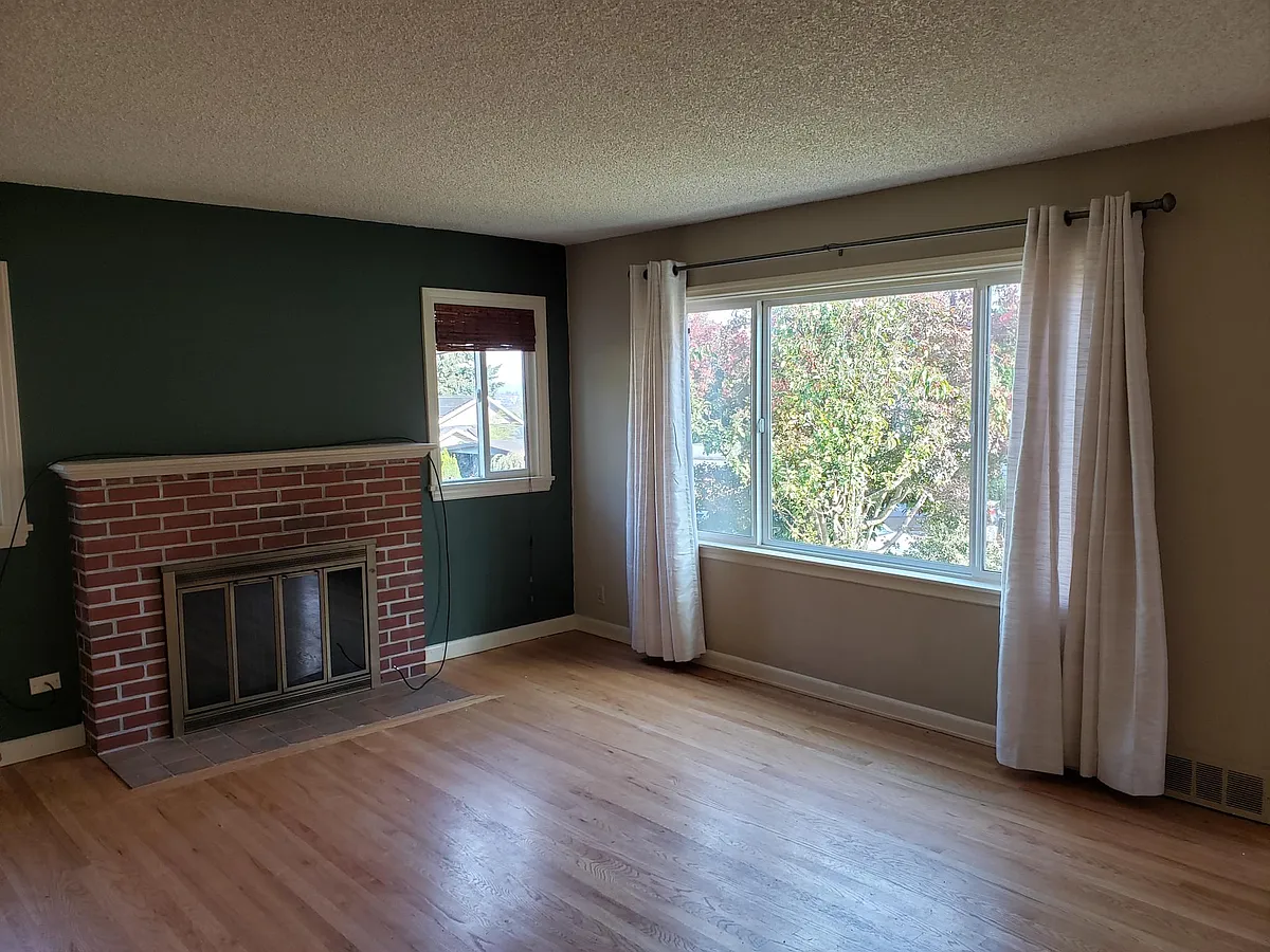 Living Room with gas fireplace - 10247 Occidental Ave S