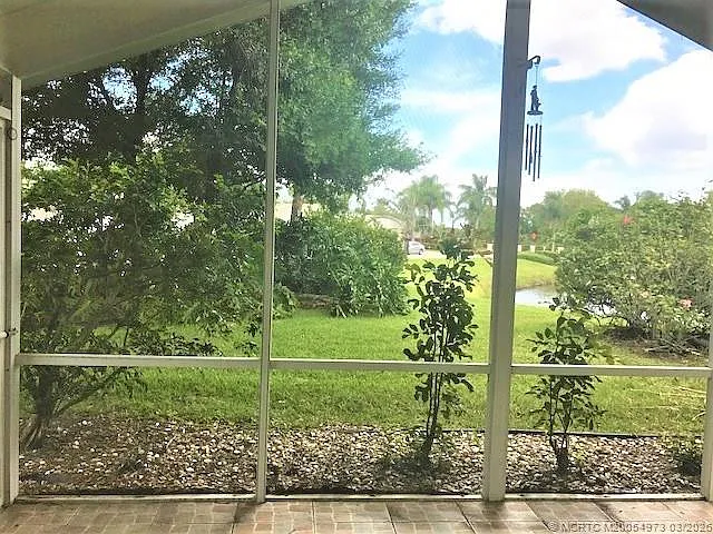 3486 SW Pindo Palm Ln — Photo 26
