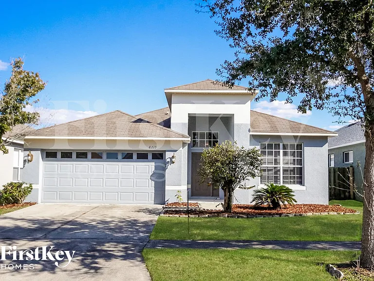 8719 Sandy Plains Dr — Photo 1