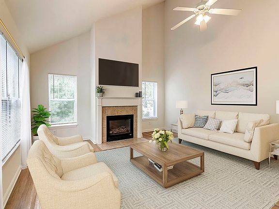 Renovated Package I living area with hard surface flooring