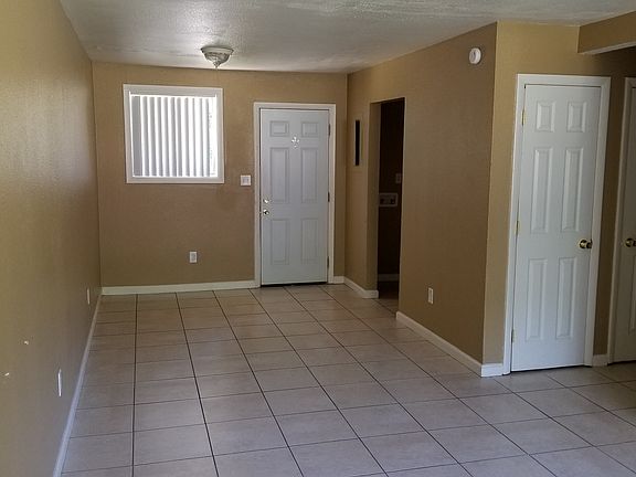 Living Room (Front) and Eating Area (Rear) with New Tile Flo