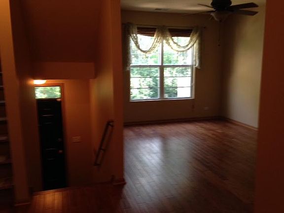 view from 1st floor hallway to front door