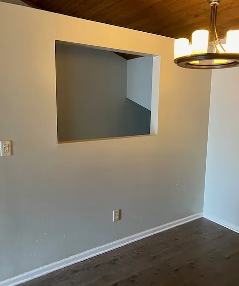 view of room and lighting from the kitchen counter