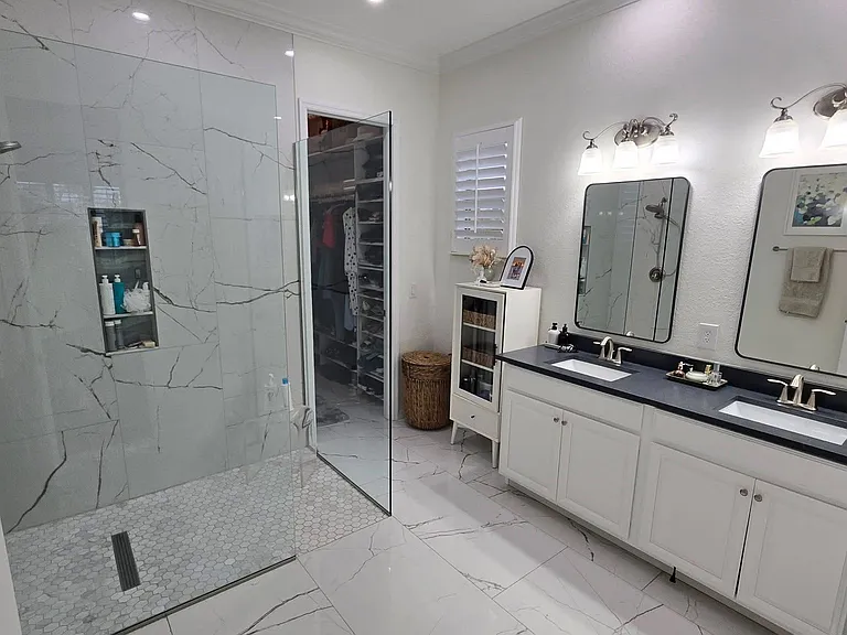 Primary bath with gorgeous tile and large shower