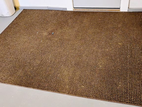 Large entry mat to wipe the snow & mud.