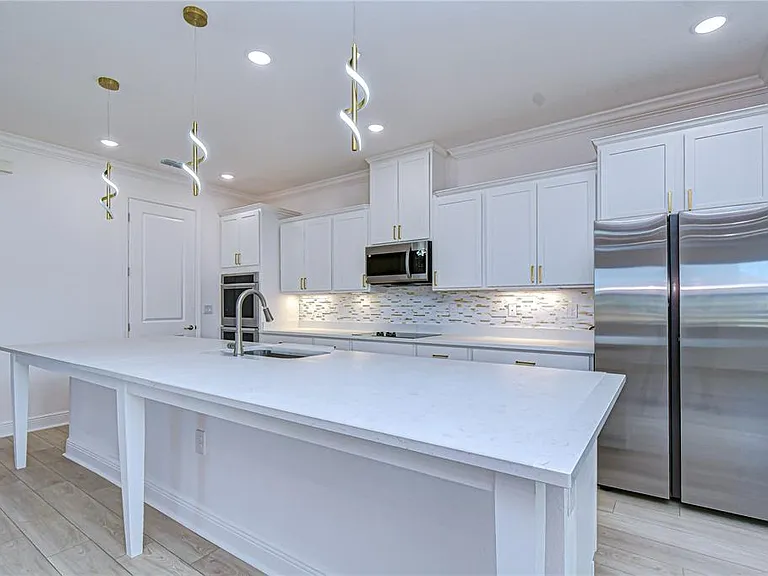 10027 Dolphin Gull Cir — Photo 26