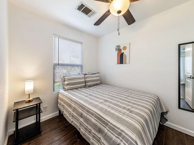 Cozy 1st floor bedroom with ceiling fan