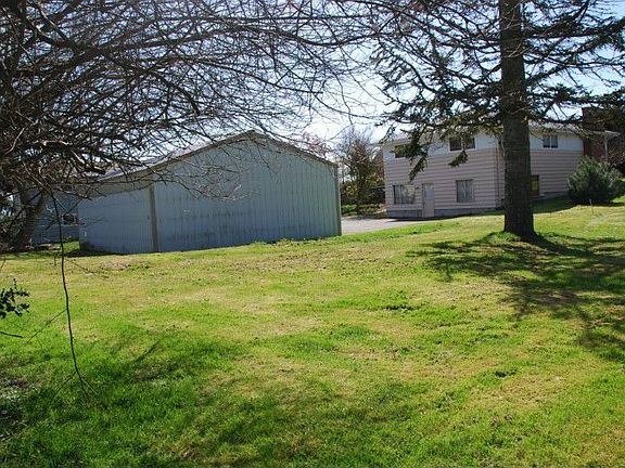 Picture taken from the North-East corner towards the house and detached garage.