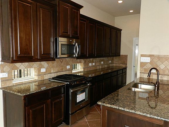 5th image of 23 S Whistling Swan Pl