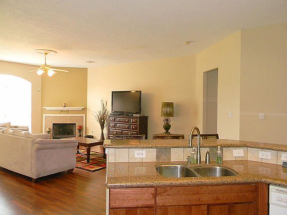 Open living and kitchen room floor plan is also ideal for dining and entertaining.