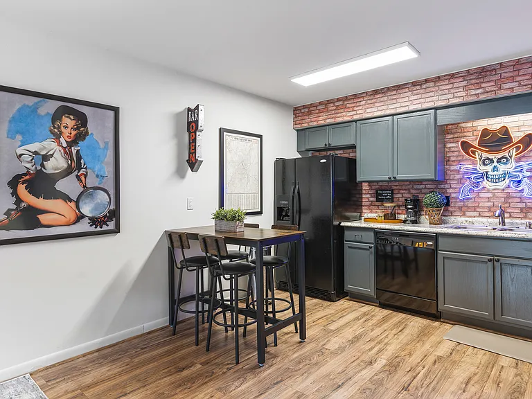 Fully equipped kitchen for all of your cooking needs! Dining table with seating for 4.