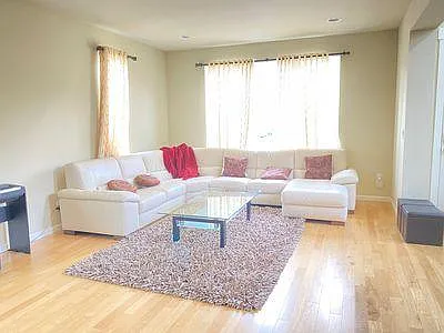 Spacious living room to host big party of guests, right next to the foyer area