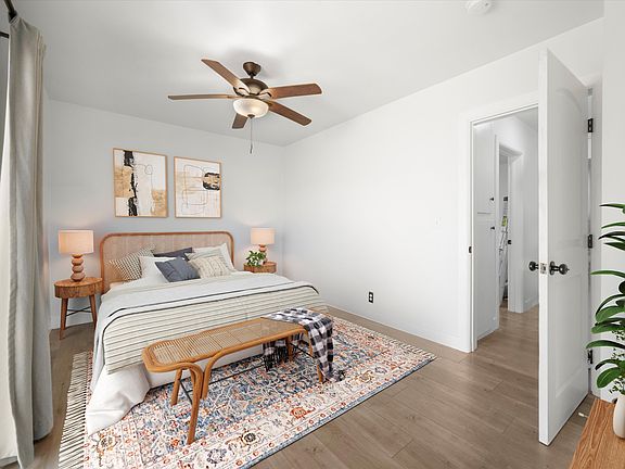 Primary bedroom with access to private patio