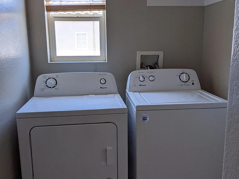 Full sized laundry room upstairs for convenience.