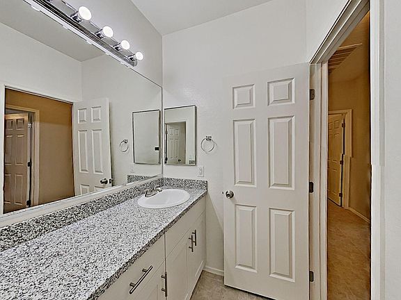 5th image of 15206 W Port Royale Ln #1
