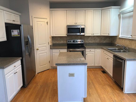 Kitchen Granite tops and stainless appliances.