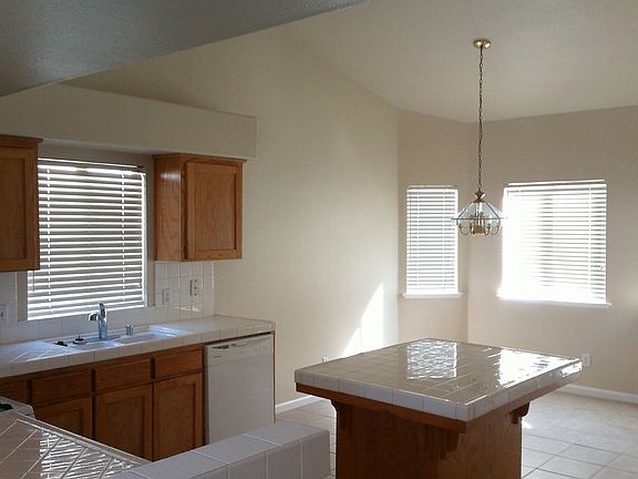5th image of 9842 N Woodrow Ave