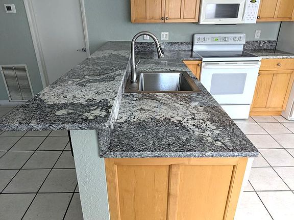 Kitchen granite countertop & wet bar