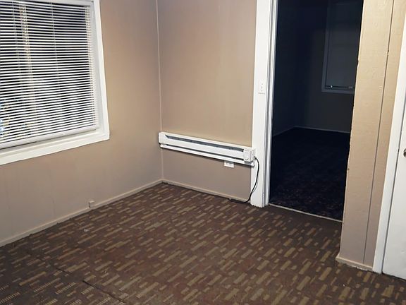 Main bedroom door to 2nd bedroom