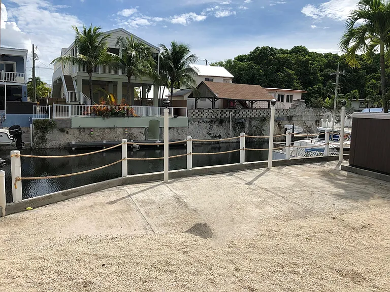 Ground level water views leading down to dock.