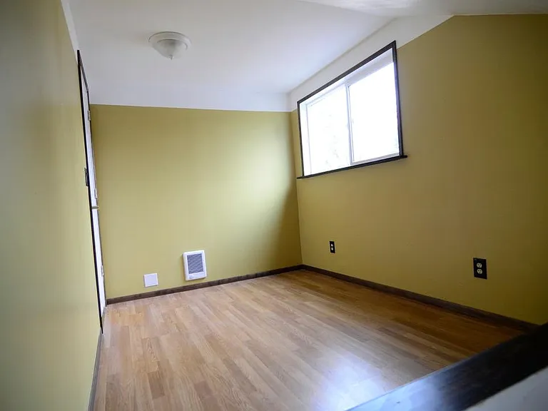 Second bedroom with newer window.