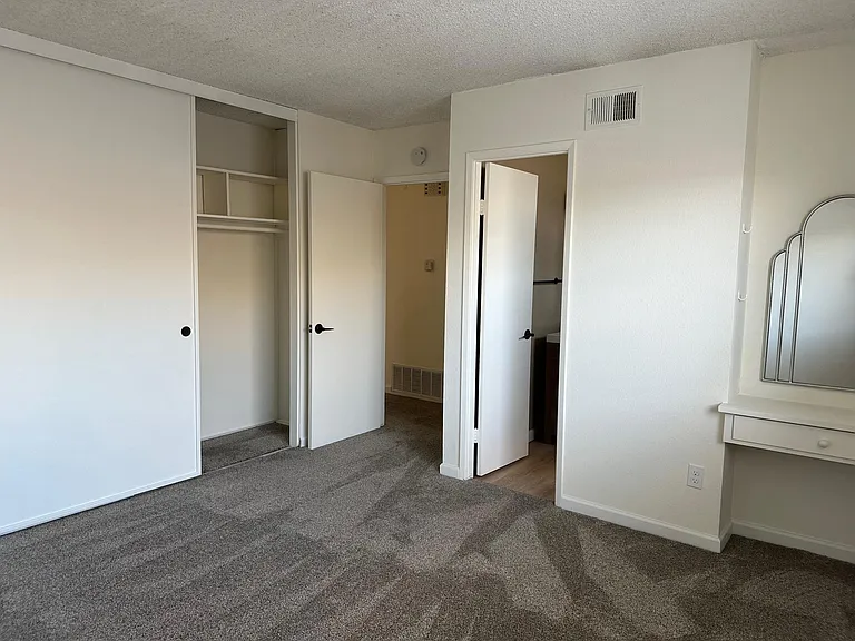 Master Bedroom and Entry to Master Bathroom