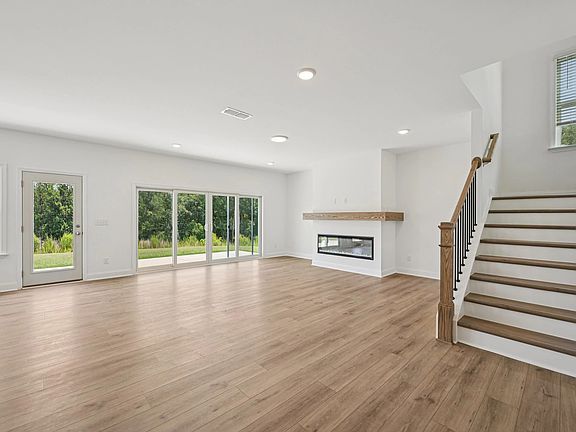 Family Room featuring the AW Collection R Serene - Open space with natural finishes and light.