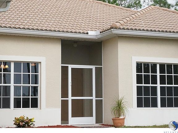 The front door hardware is brand new and the door has been painted. The porch floor was also cleaned and freshly painted with epoxy. Windows are also pristine.