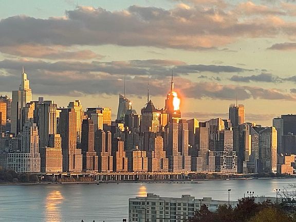 Sunset reflecting on NYC skyline