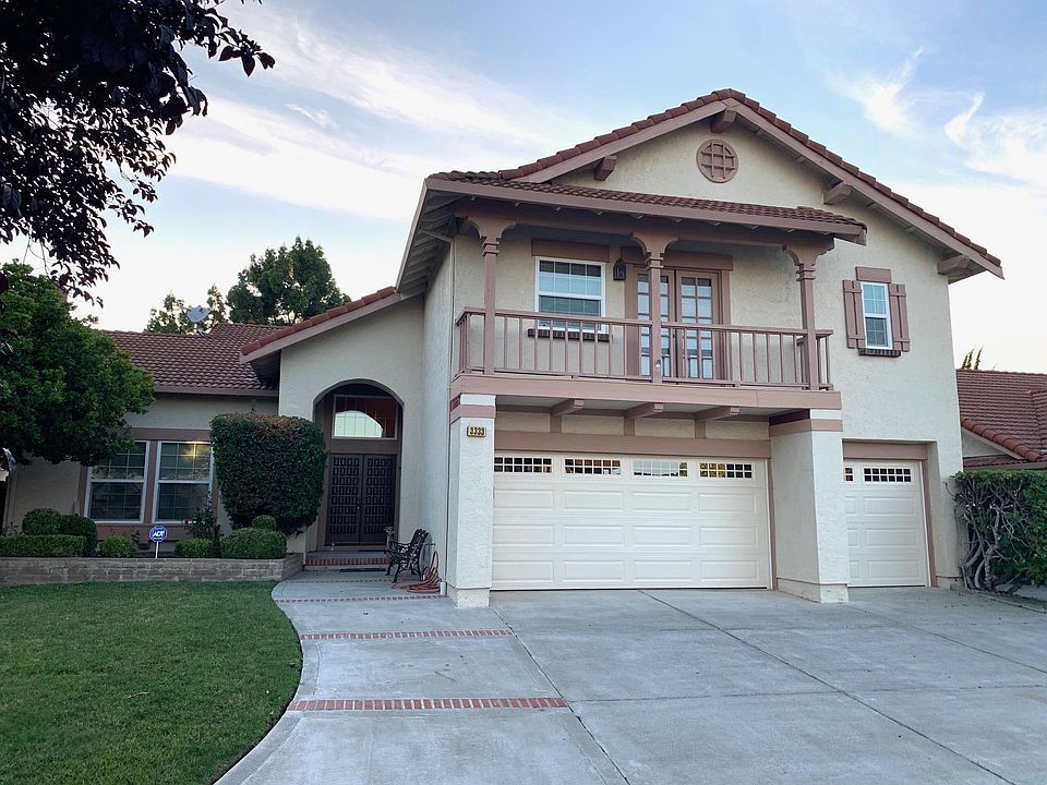 Front of house with 3 car garage