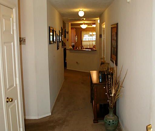Nice foyer with tile entrance and views through to the kitchen and living space