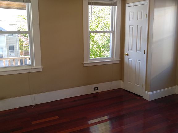 Primary bedroom, hardwood floor.