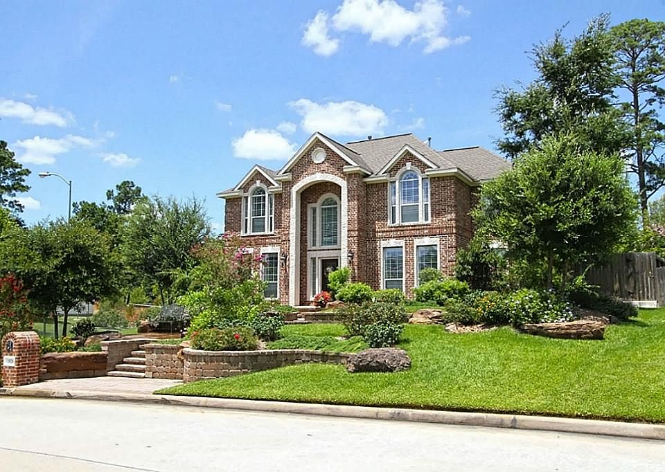 The lavishly Landscaped Entranceway welcomes you home to Peaceful Surroundings and are a fitting introduction to a Superb home!