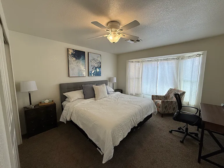 Master bed room , King size bed w/ work desk and office chair