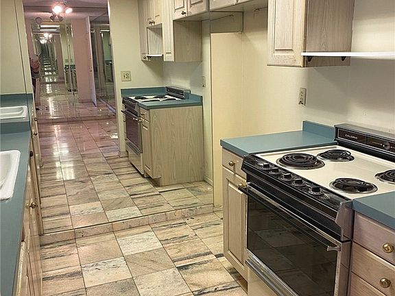 5th image of 5460 White Oak Ave Unit E305
