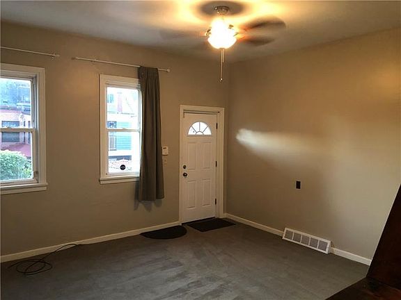 Spacious Living Room w/High Ceilings and Excellent Natural Light!