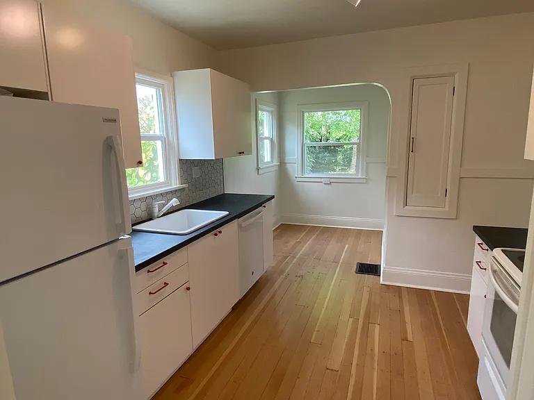 Brand new kitchen with dishwasher and hood that vents to the outside