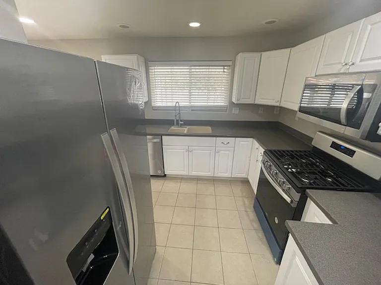 8332 Huxley St — Photo 7