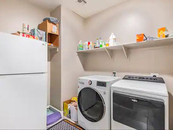 Shared Laundry Room Washer, Dryer and Full Size Refrigerator