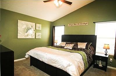 Master bedroom suite with two closets.