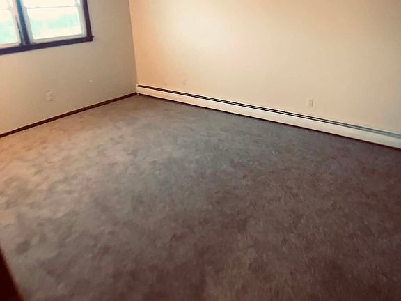 large master bedroom easily accommodates king size bed