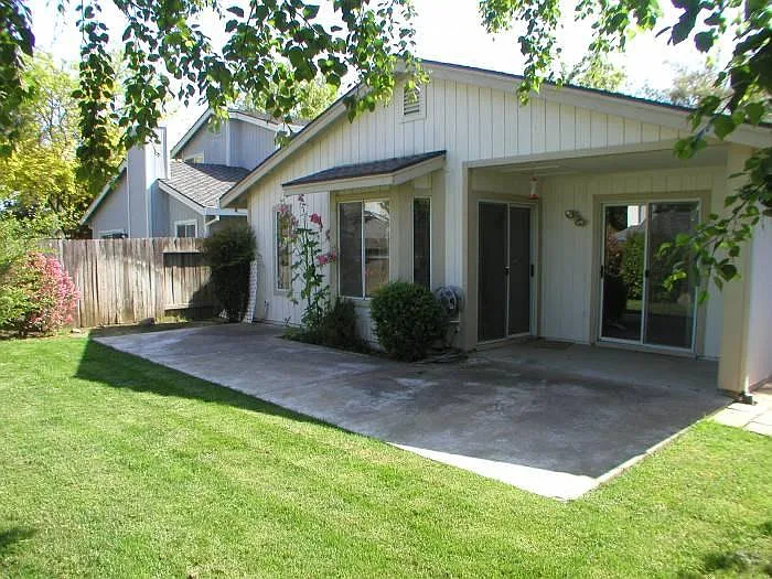 Back of House showing patio and yard area.