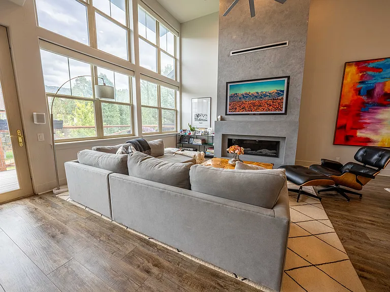 Upper level with private deck outside with gas hookup.