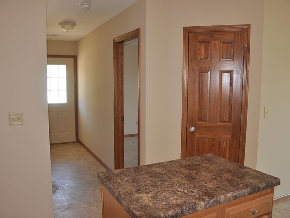 Kitchen looking at entry door