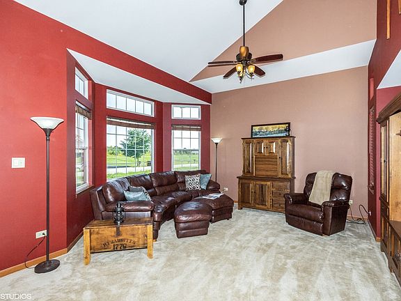 Large Open living room with soaring ceilings to second floor