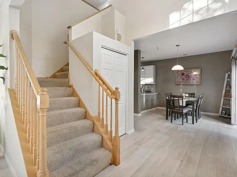 Stairs with dinning room view